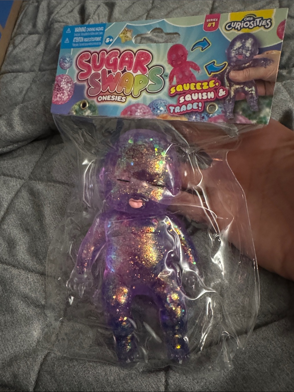 Sugar swaps Onesies Purple Glitter Squeeze Toy